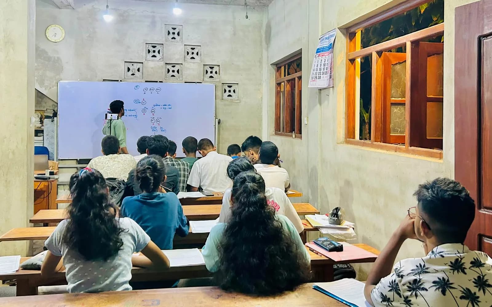 Ayusha Sir teaching a Combined Mathematics class